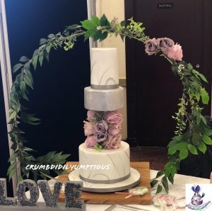 floral hoop 3 tiered wedding cake
