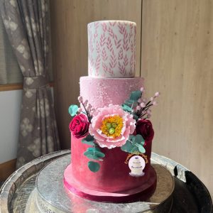 Wedding cakes in Fife, burgundy and pink with open peony Crumbdidilyumptious