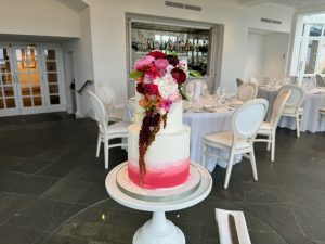 Wedding cakes in Fife Red ombré buttercream with fresh edible flowers, wedding cakes in Fife