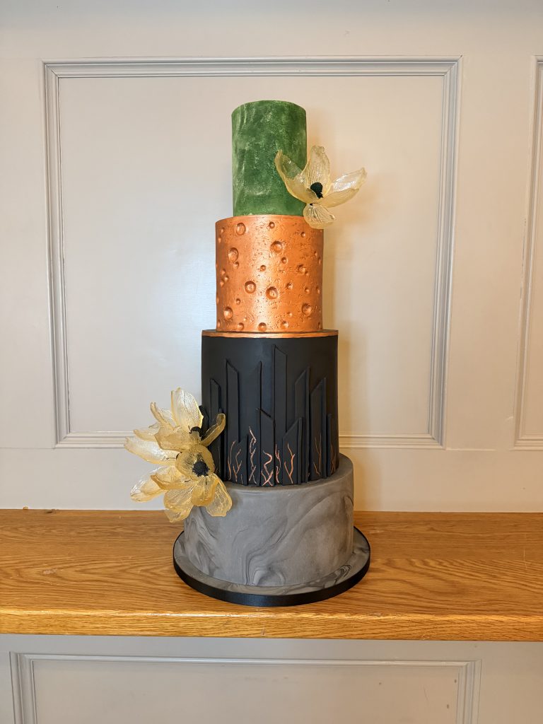 Luxury wedding cakes Glasgow: A modern, sculptural multi-tiered wedding cake featuring bold architectural textures, designed for the industrial-luxe setting of The Engine Works in Glasgow.