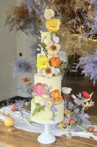 Colourful wedding cake with handmade sugar flowers by CDU Cakes in Scotland