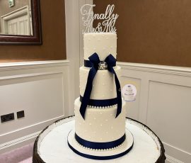 Ribbon diamanté and pearl Ribbon and pearl wedding cake scotland testimonials