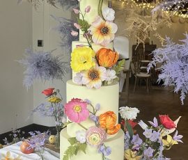 Pastel floral Bespoke luxury wedding cake with sugar flowers by Crumbdidilyumptious glenrothes St Andrews wedding cakes Scotland