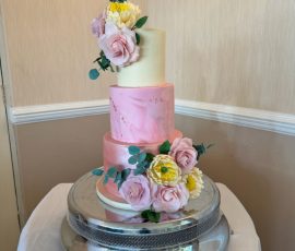 Pink floral unique wedding cakes in Fife