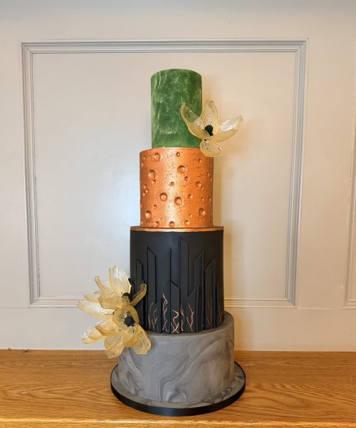 Bespoke copper and black geometric wedding cake with architectural textures for luxury St Andrews weddings. Dundee industrial venues